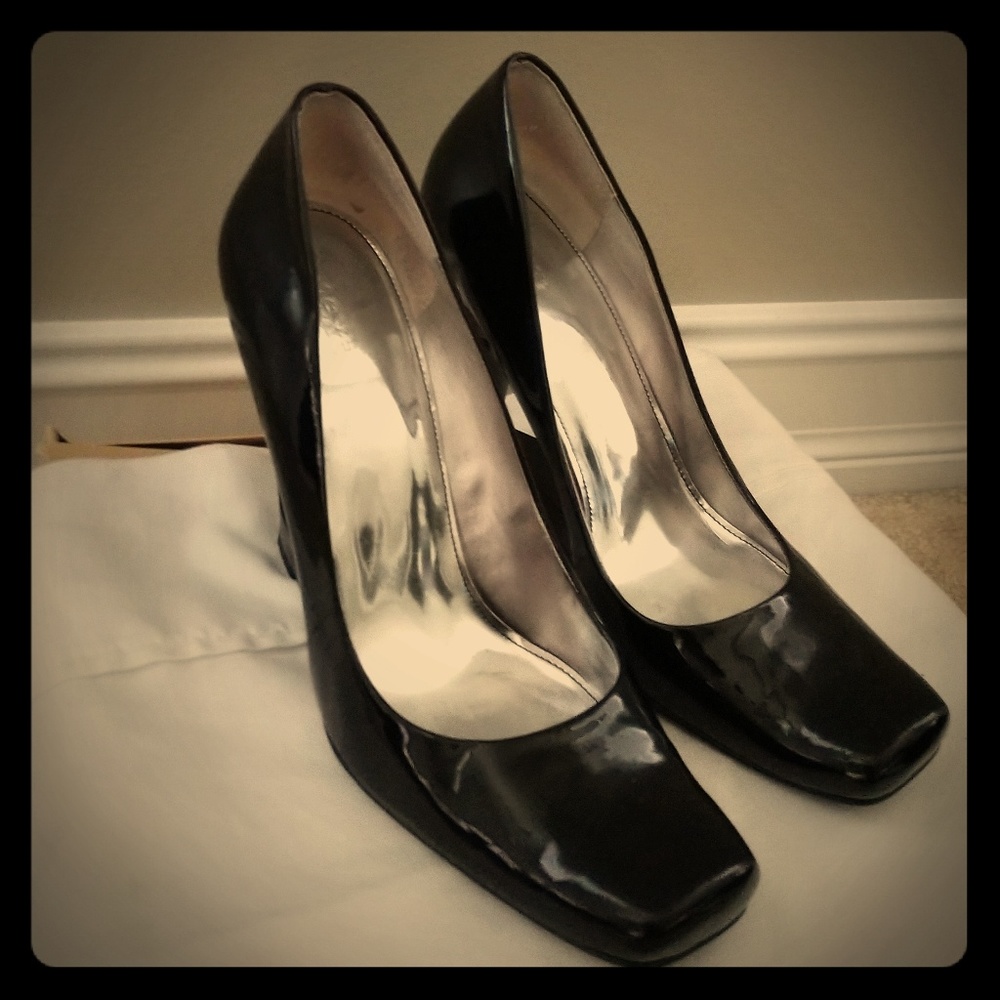 Black wedge pumps